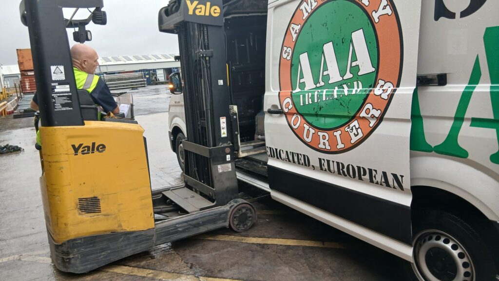 Forklift loading a AAA Vans Ireland courier van for retail delivery