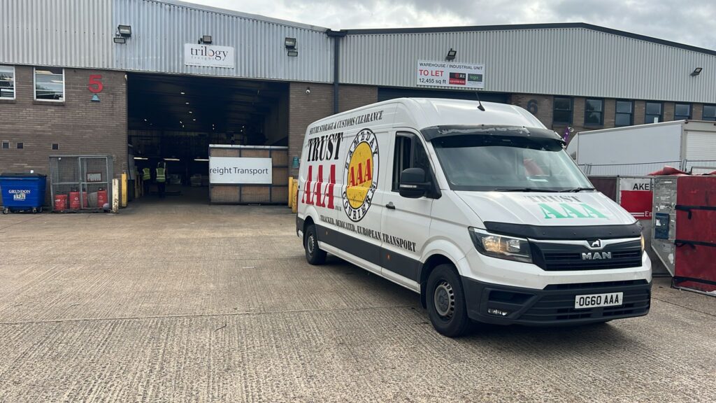 AAA Vans branded courier van parked at a retail storage and freight transport unit